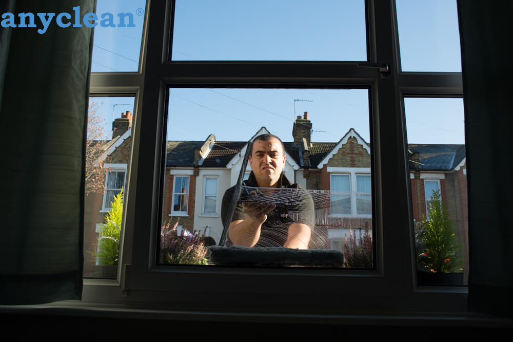 Residential window pane squeegee polish near FQRV+6C London, United Kingdom